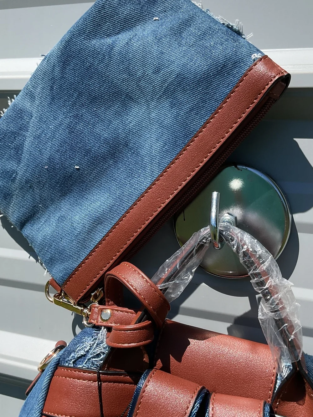 Denim Fringe Quilted Backpack with Brown Trim
